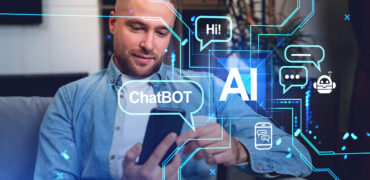 Smiling man working with phone and chatbot. AI helps to generate idea and text. Hologram hud with speech bubbles and icons. Concept of virtual assistant and online communication
